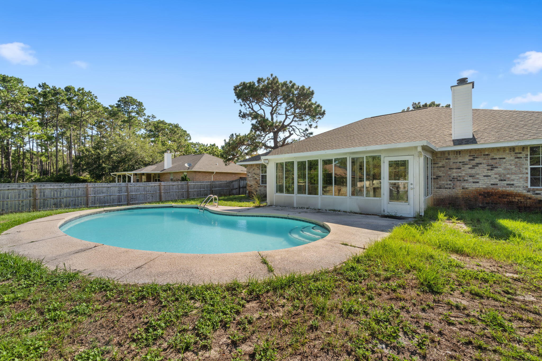 2005 Cardinal Lane Navarre, FL 32566 - Photo 45 of 63 a view of a house with pool