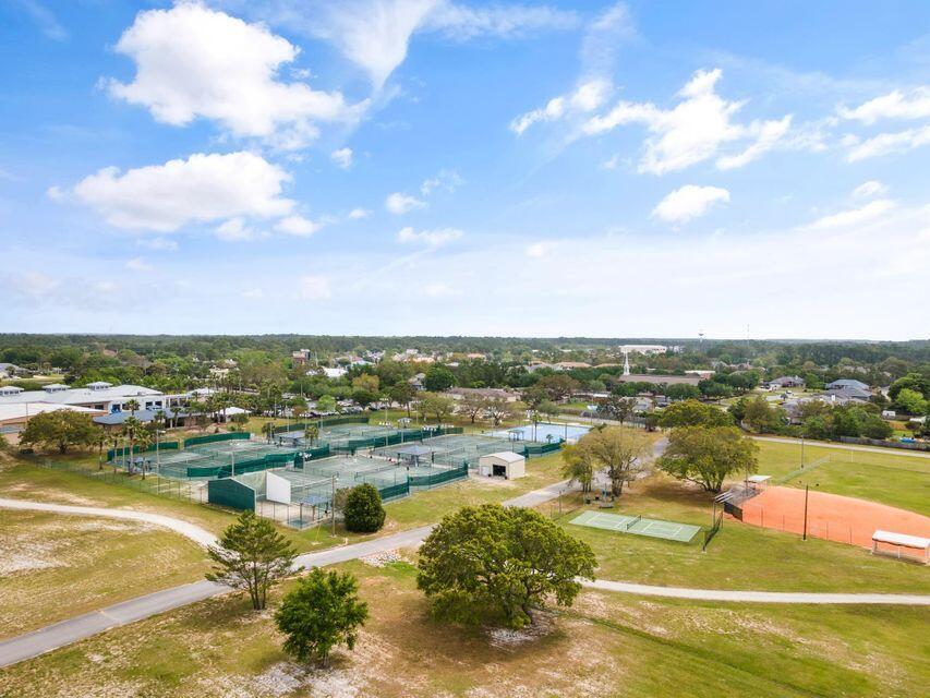 2005 Cardinal Lane Navarre, FL 32566 - Photo 47 of 63 a view of a lake with houses