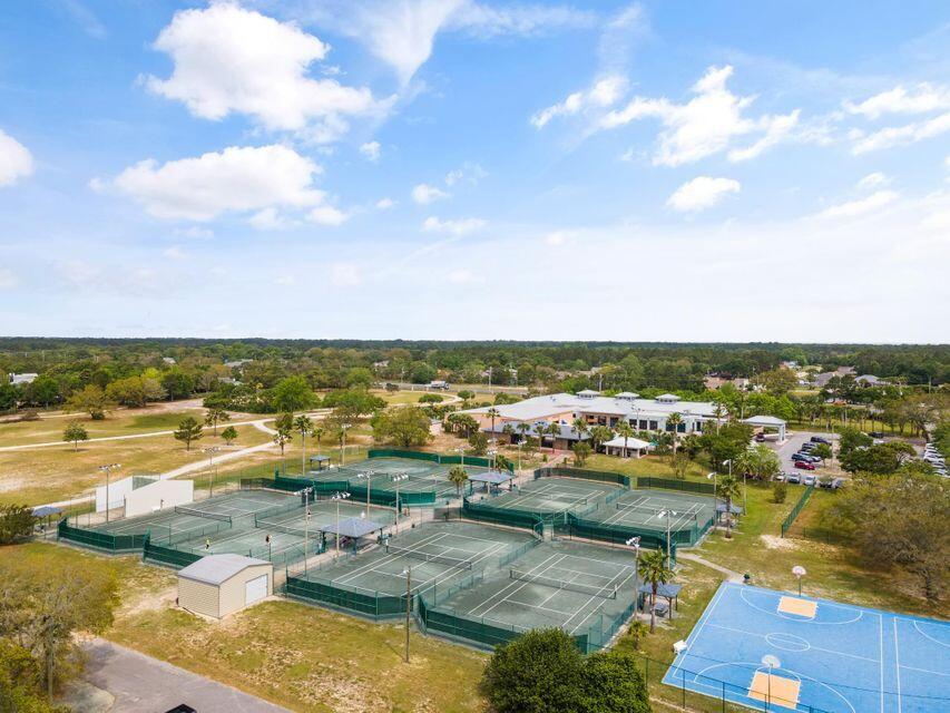 2005 Cardinal Lane Navarre, FL 32566 - Photo 55 of 63 a view of a lake with a city