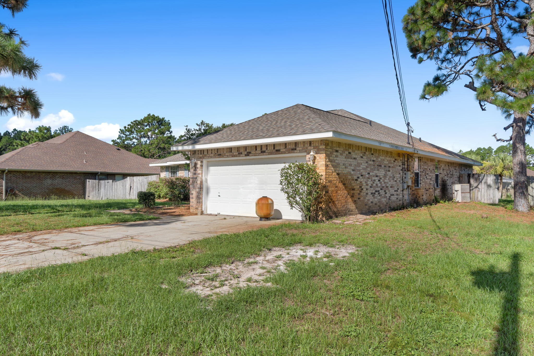 2005 Cardinal Lane Navarre, FL 32566 - Photo 6 of 63 a front view of a house with garden
