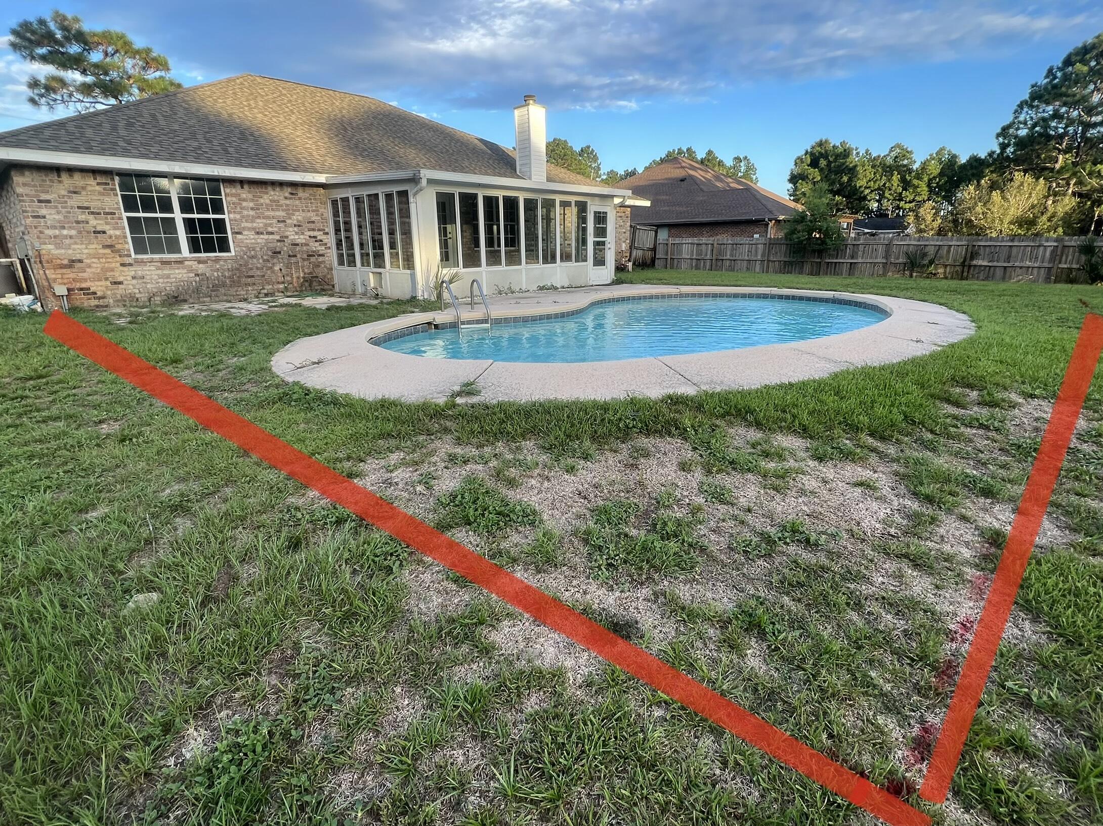 2005 Cardinal Lane Navarre, FL 32566 - Photo 63 of 63 a view of a house with a yard and a park