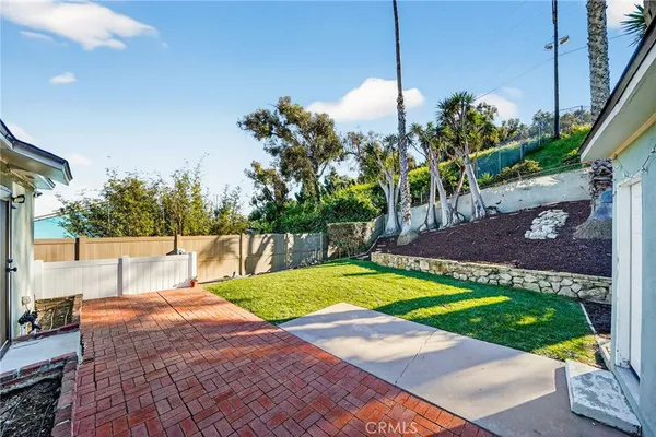 a view of yard with swimming pool