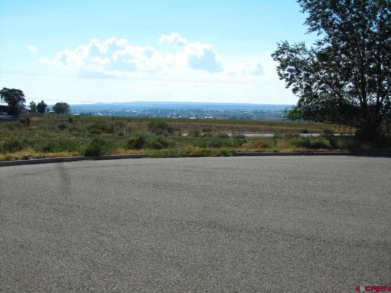 Tbd Tbd Par Drive Cortez, CO 81321 - Photo 3 of 9 a view of a lake with a city