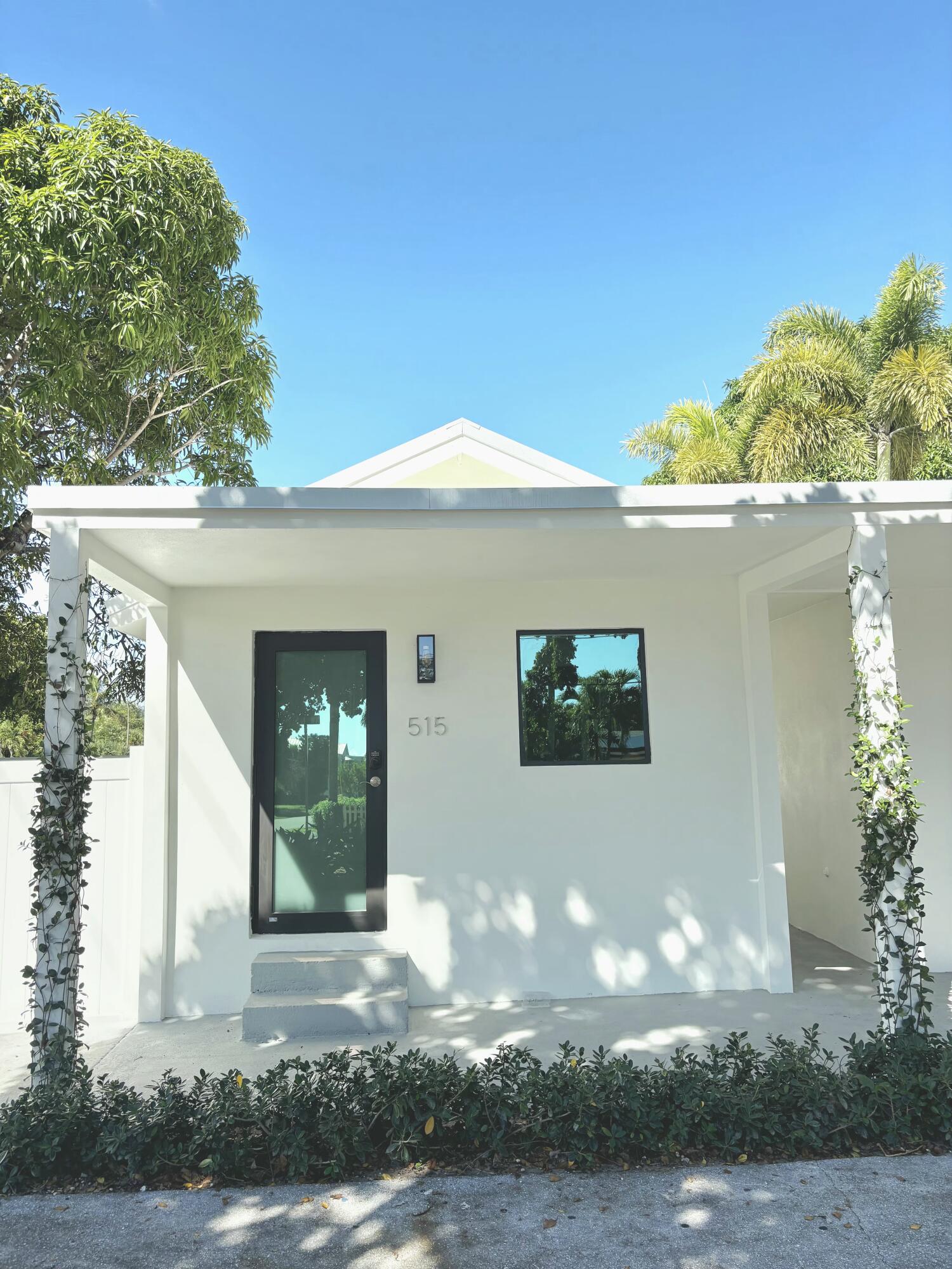 515 Northwest 1st Street, Unit 1 Delray Beach, FL 33444 - Photo 18 of 35 a view of a house with a yard