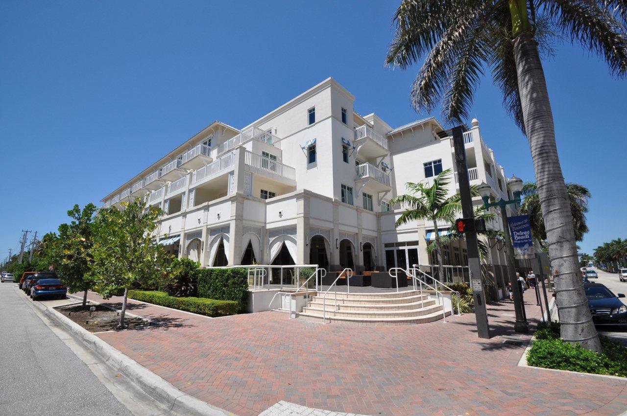 515 Northwest 1st Street, Unit 1 Delray Beach, FL 33444 - Photo 30 of 35 a front view of a building with tree s