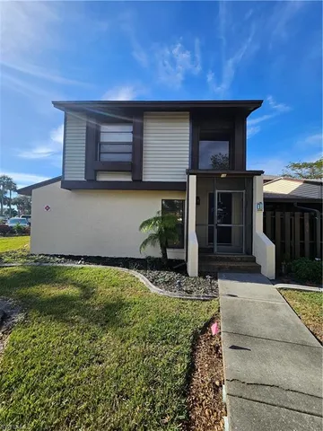 a house view with a garden space