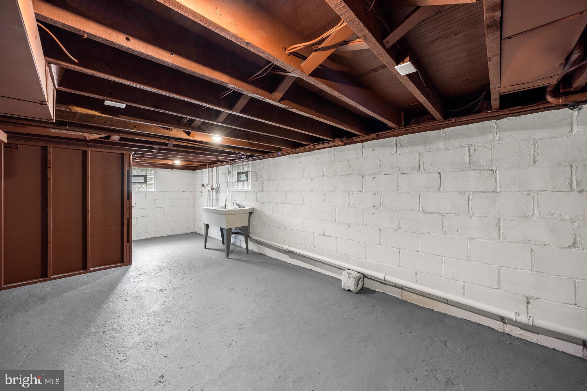 428 Oak Street Audubon, NJ 08106 - Photo 22 of 24 Basement Storage and Laundry Area