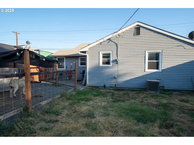 a backyard of a house with lots of green space