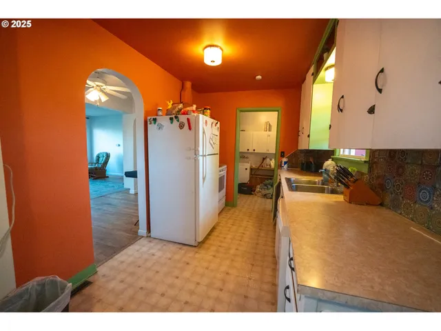 a view of living room with furniture and screen view