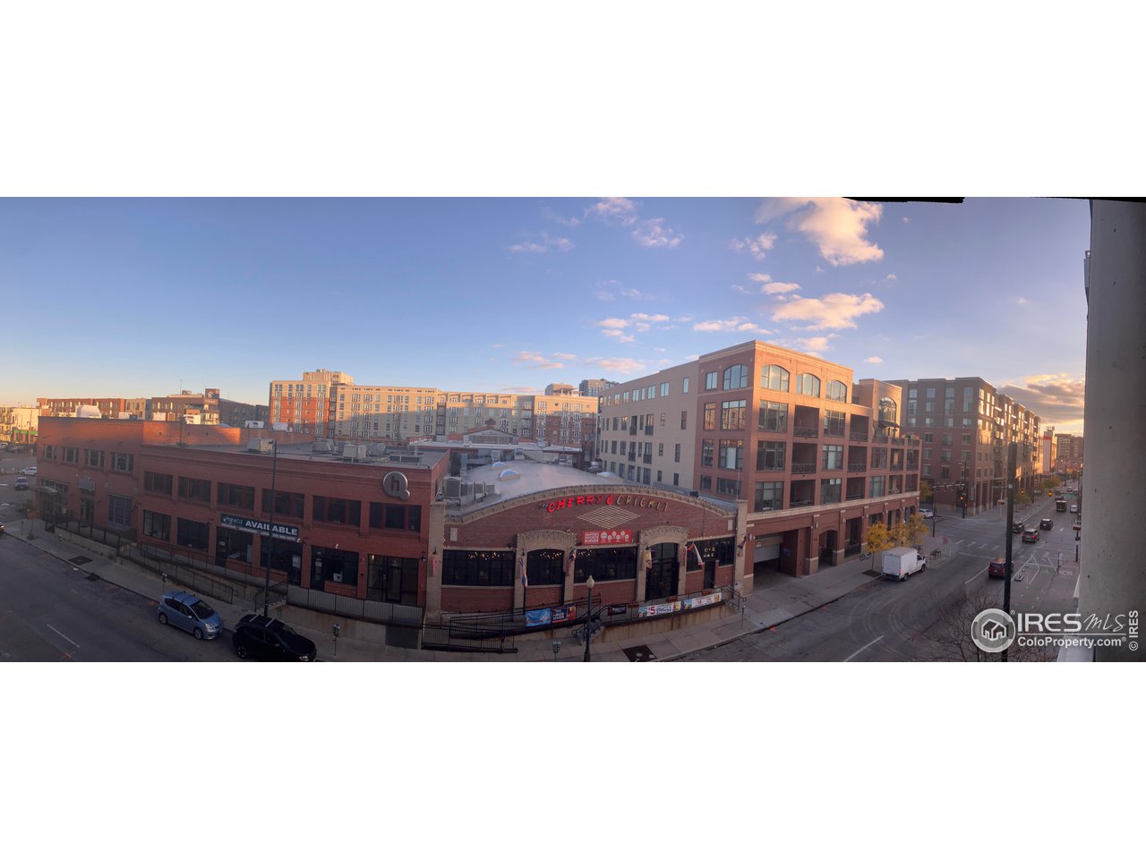 2229 Blake Street, Unit 402 Denver, CO 80205 - Photo 17 of 26 a view of a large building with a outdoor space