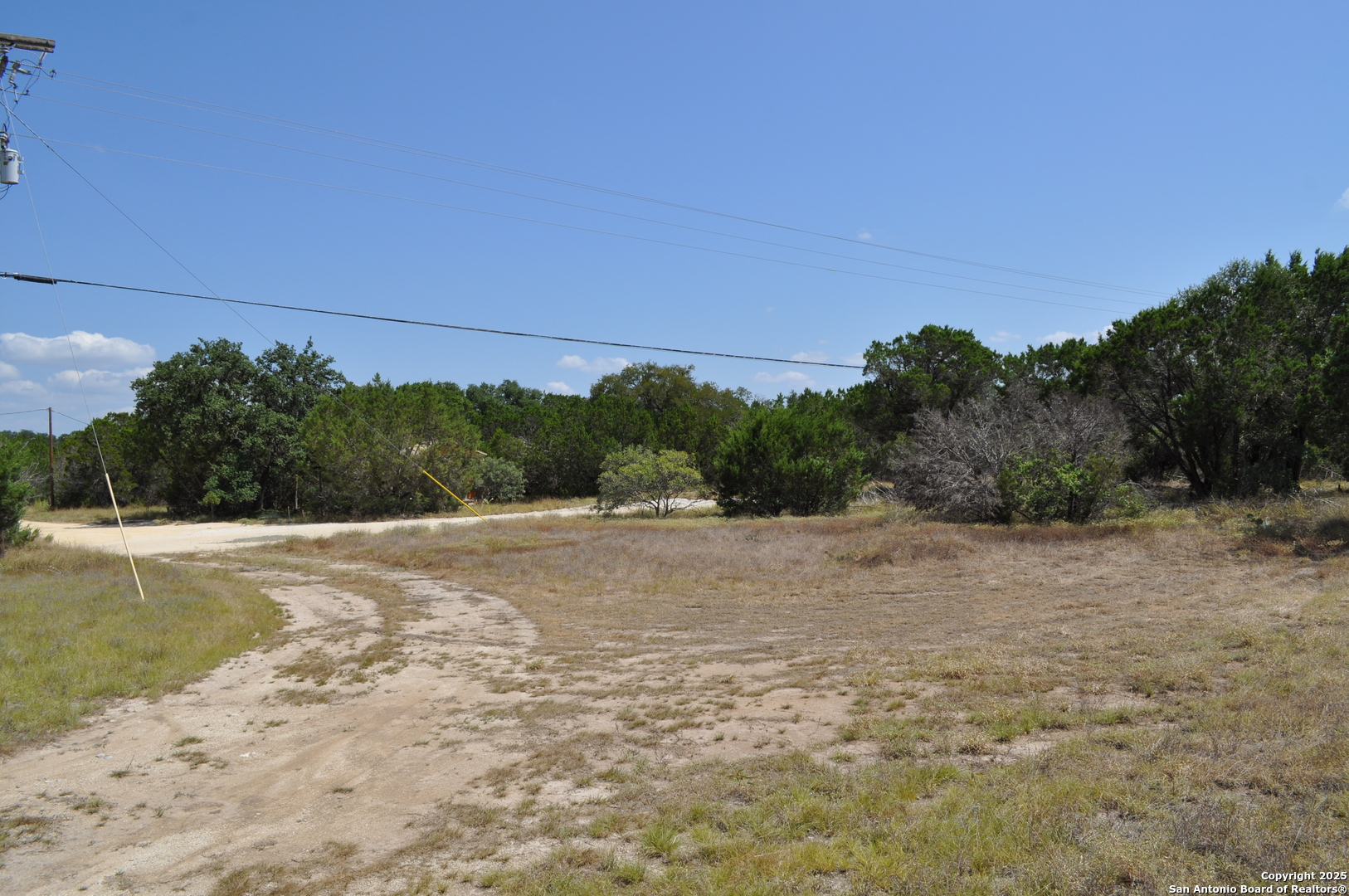 1608 Campfire Drive Spring Branch, TX 78070 - Photo 5 of 11 a view of a field with trees in background