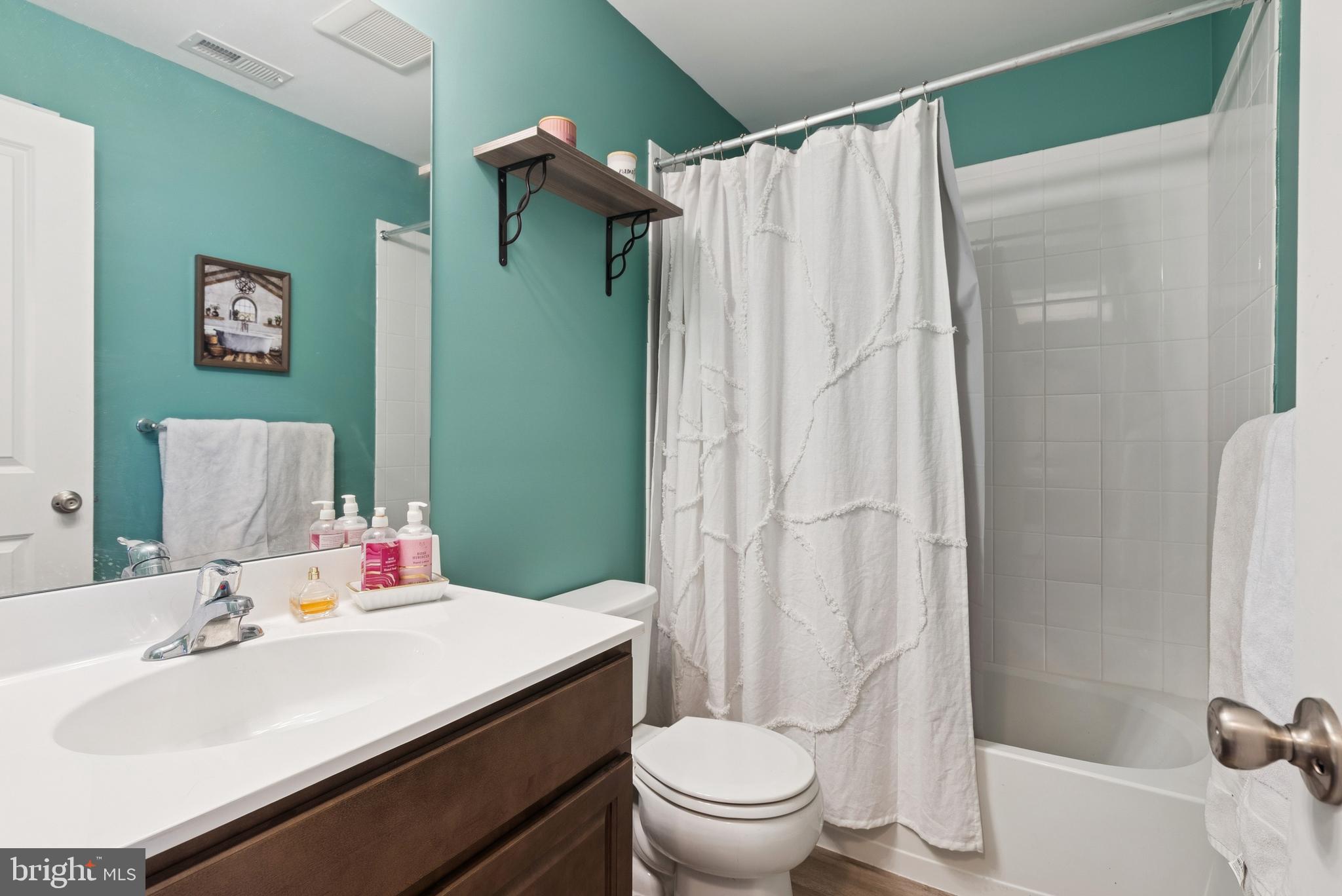 94 Aviary Road Thorofare, NJ 08086 - Photo 19 of 24 a bathroom with a sink toilet and shower