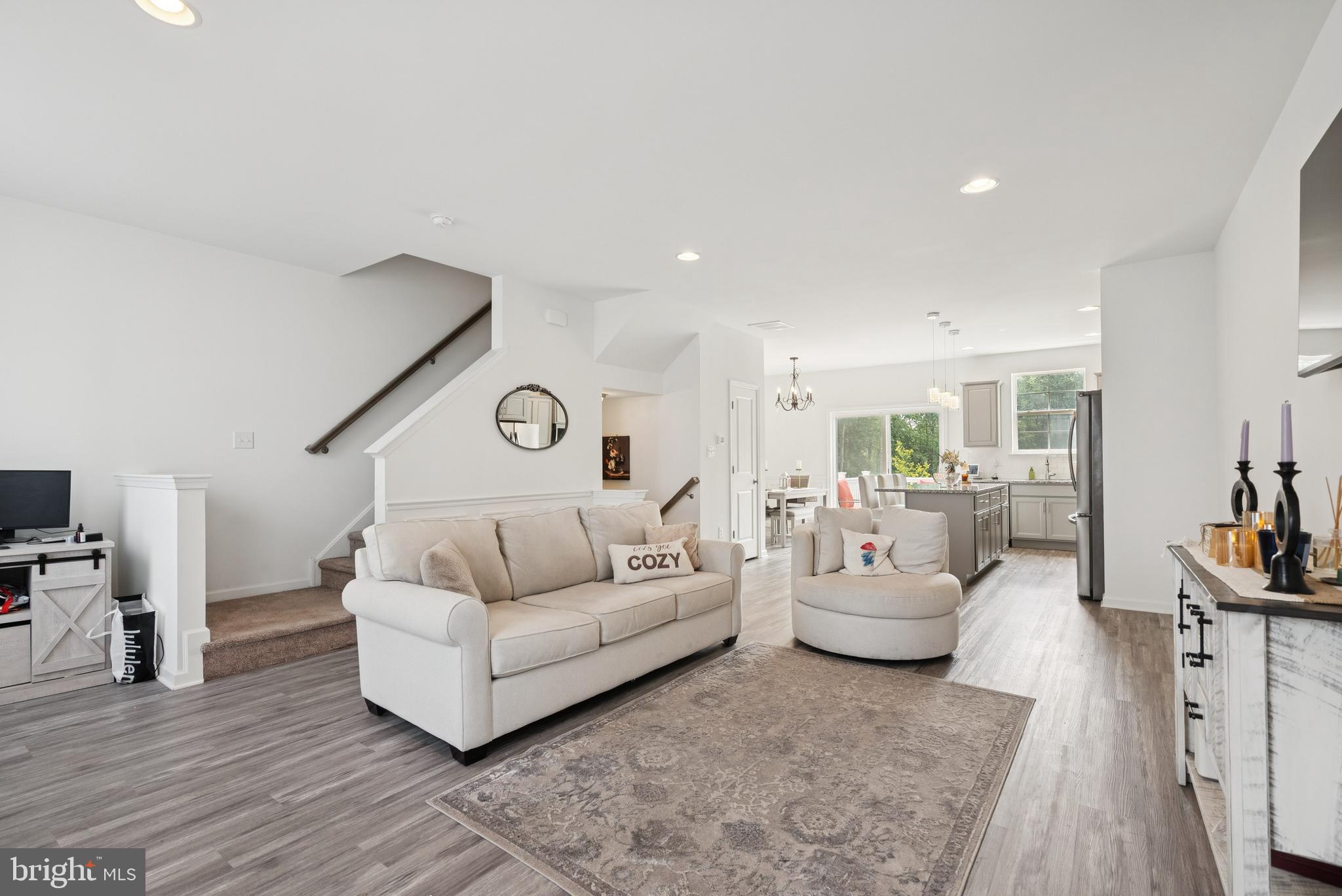 94 Aviary Road Thorofare, NJ 08086 - Photo 8 of 24 a living room with furniture and a large window