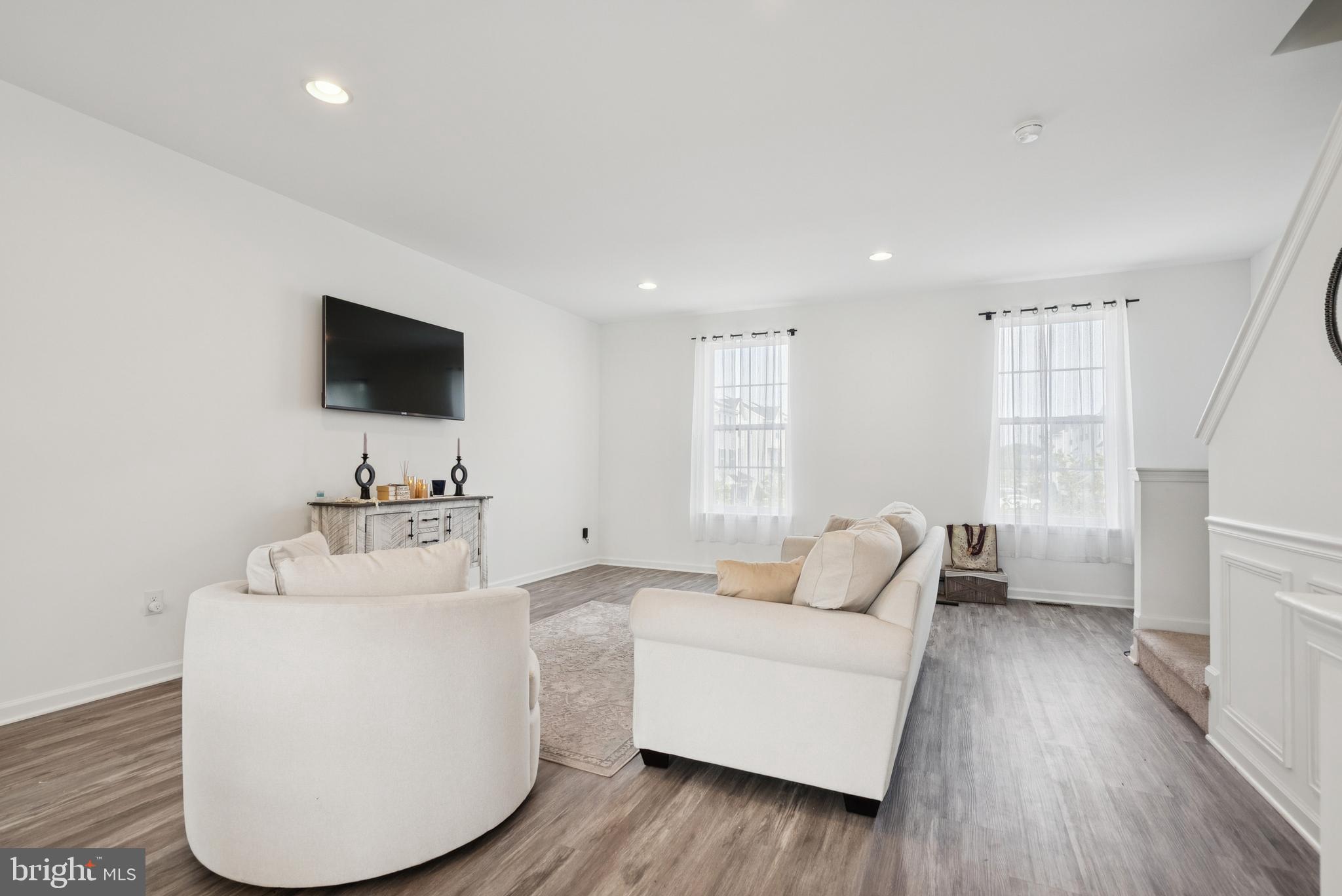 94 Aviary Road Thorofare, NJ 08086 - Photo 9 of 24 a living room with furniture and a flat screen tv