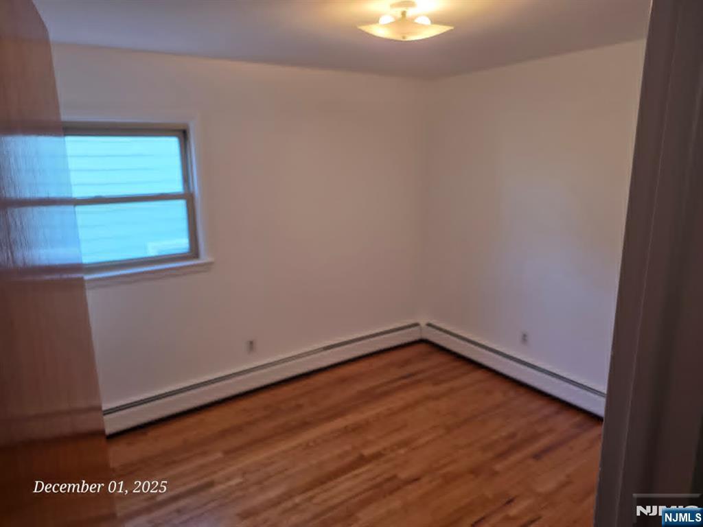 174 Highland Cross Rutherford, NJ 07070 - Photo 8 of 10 a view of an empty room with a window