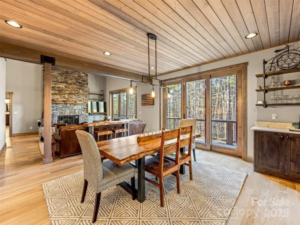 a dining room with furniture window wooden floor