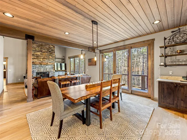a dining room with furniture window wooden floor