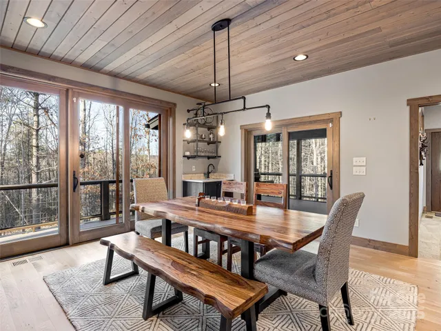 a dining room with furniture window wooden floor