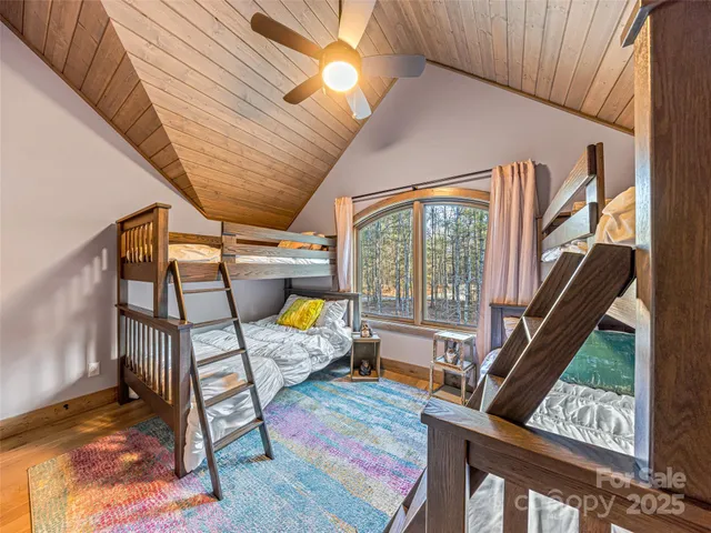 a bed room with furniture and a window