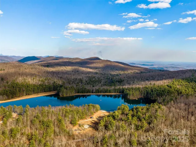 a view of a lake with mountain in the background