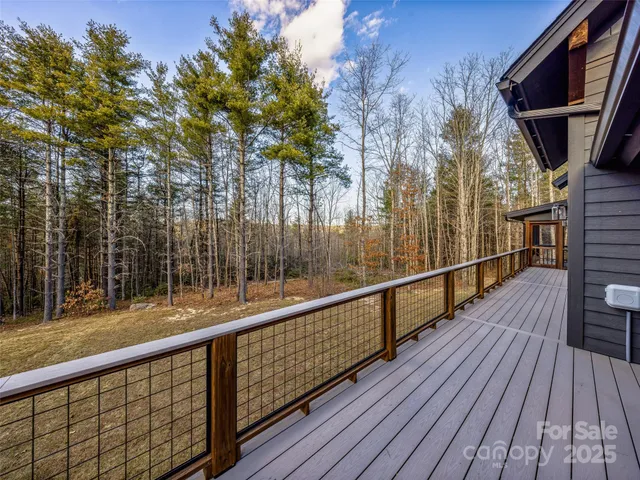 a view of swimming pool with an outdoor seating