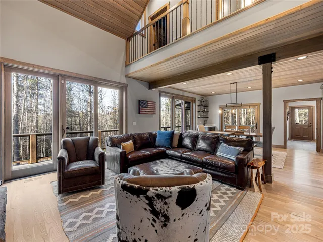 a living room with furniture and a rug