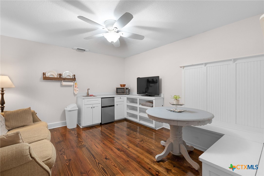 951 Moseley Road Copperas Cove, TX 76522 - Photo 14 of 43 a view of a dining room with furniture and wooden floor
