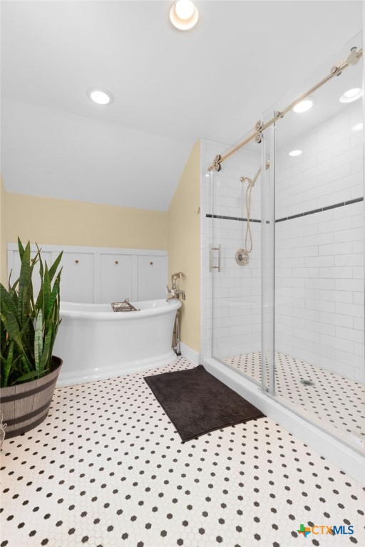951 Moseley Road Copperas Cove, TX 76522 - Photo 28 of 43 a bathroom with a bathtub and a shower
