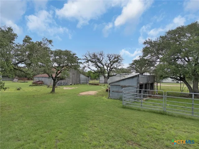 a house with trees in front of it