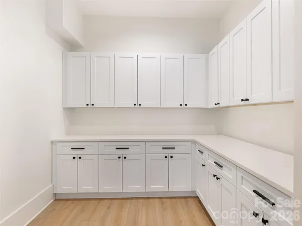 a view of white cabinets