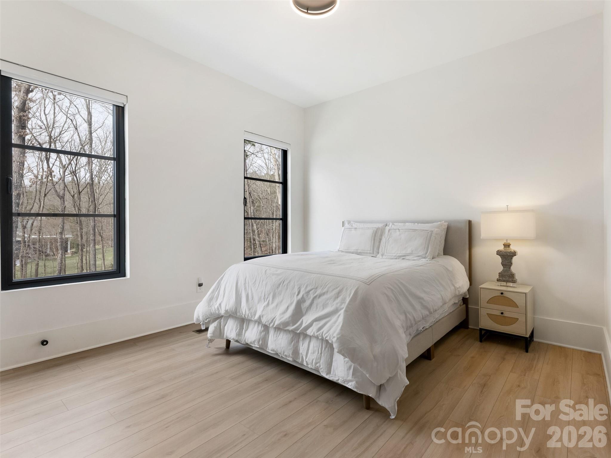 6017 Oxfordshire Road Waxhaw, NC 28173 - Photo 27 of 48 a bedroom with a bed and a window