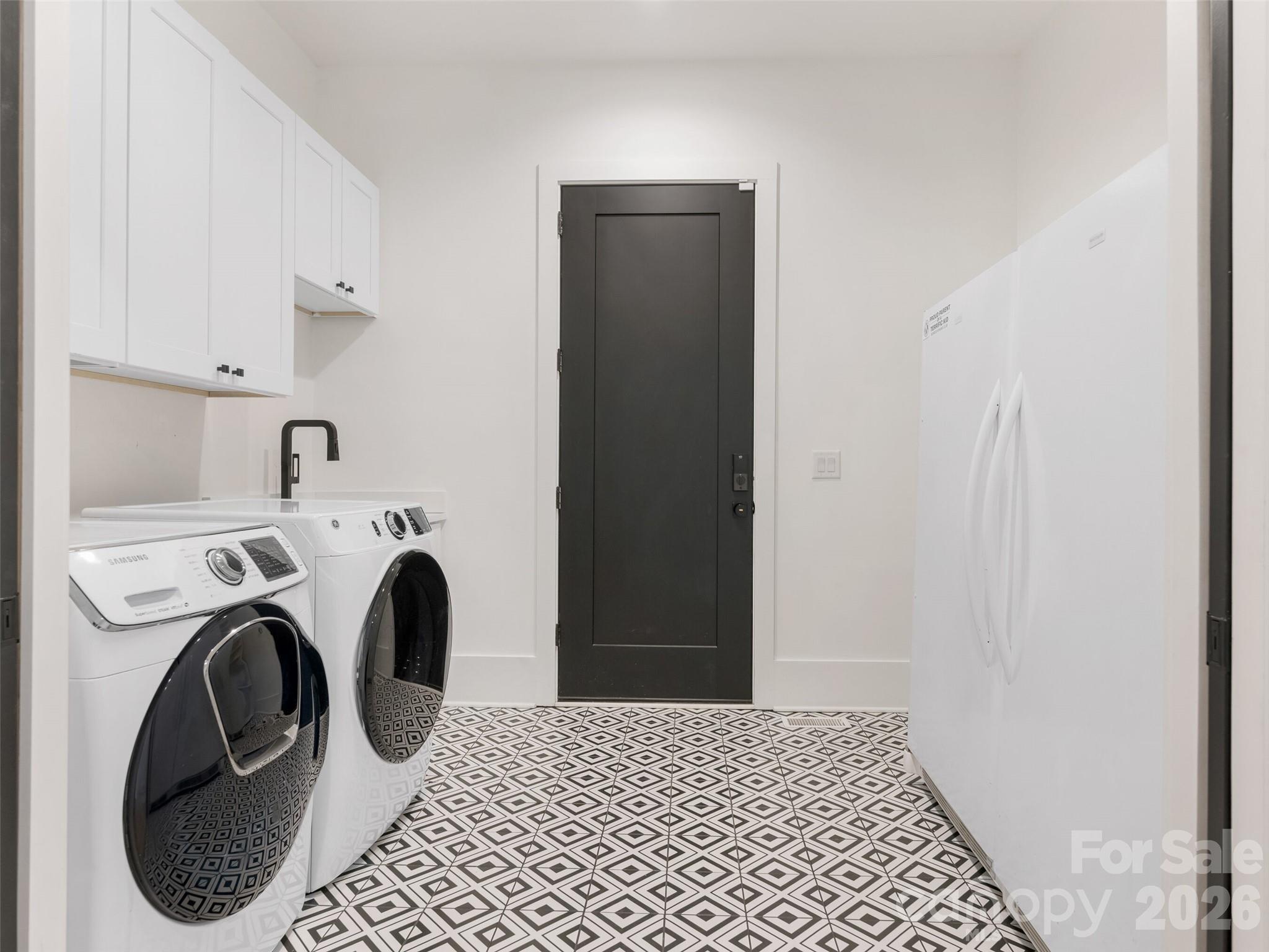 6017 Oxfordshire Road Waxhaw, NC 28173 - Photo 29 of 48 a view of bathroom with washing machine