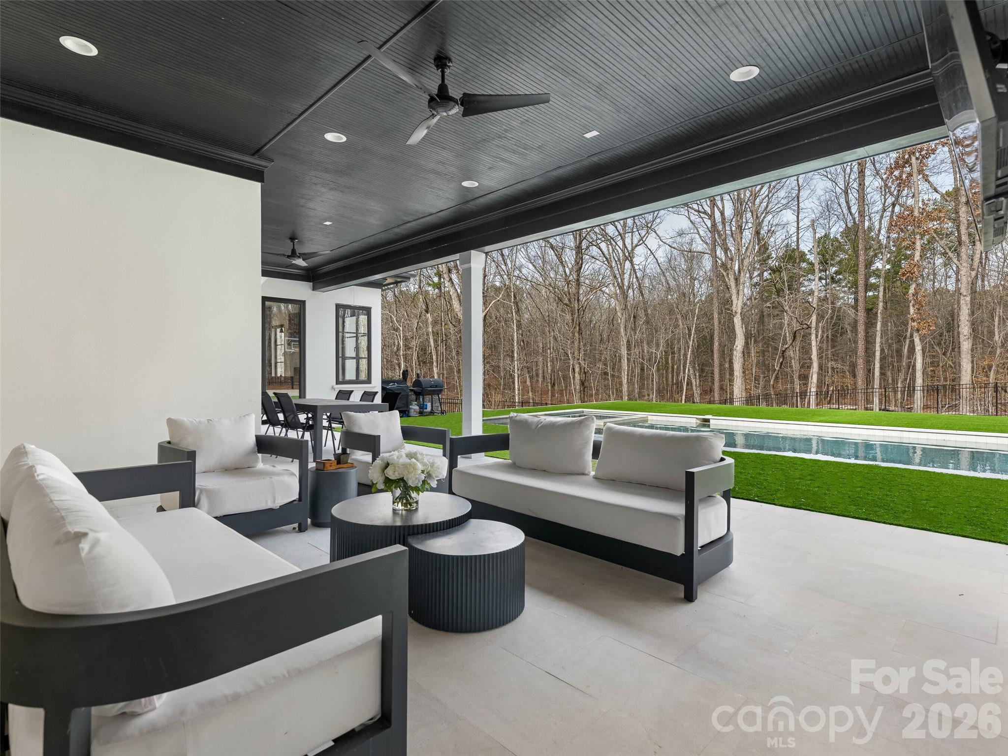 6017 Oxfordshire Road Waxhaw, NC 28173 - Photo 41 of 48 a living room with furniture and a large window