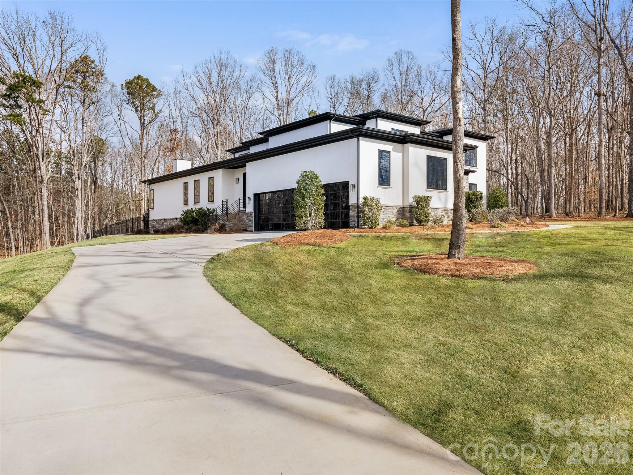 6017 Oxfordshire Road Waxhaw, NC 28173 - Photo 48 of 48 a front view of a house with a yard