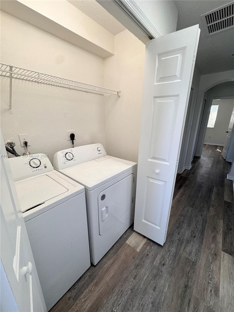 2732 Southeast 15th Place, Unit 142 Homestead, FL 33035 - Photo 15 of 20 a utility room with dryer and washer