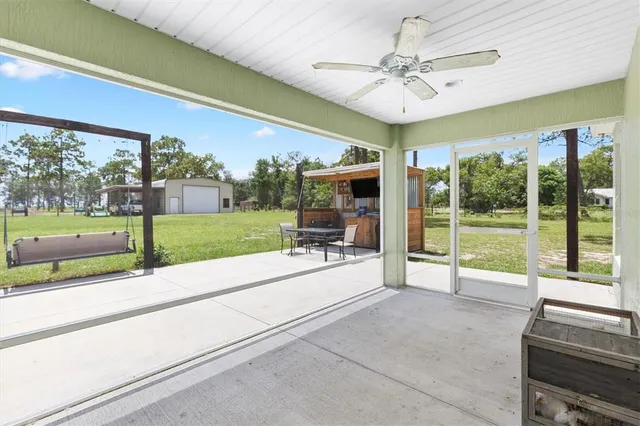 a swimming pool with a garden view