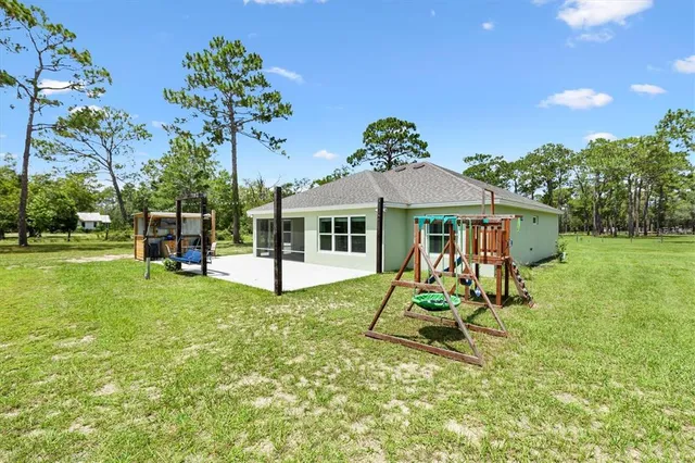 a house view with a garden space