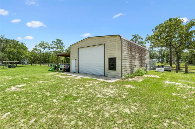 a view of a backyard of the house