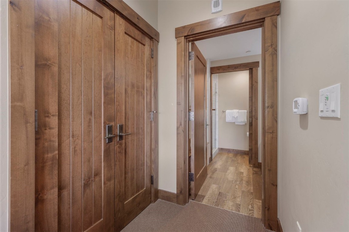 610 Columbine Road, Unit 6307 Breckenridge, CO 80424 - Photo 27 of 36 a view of a bathroom from a hallway