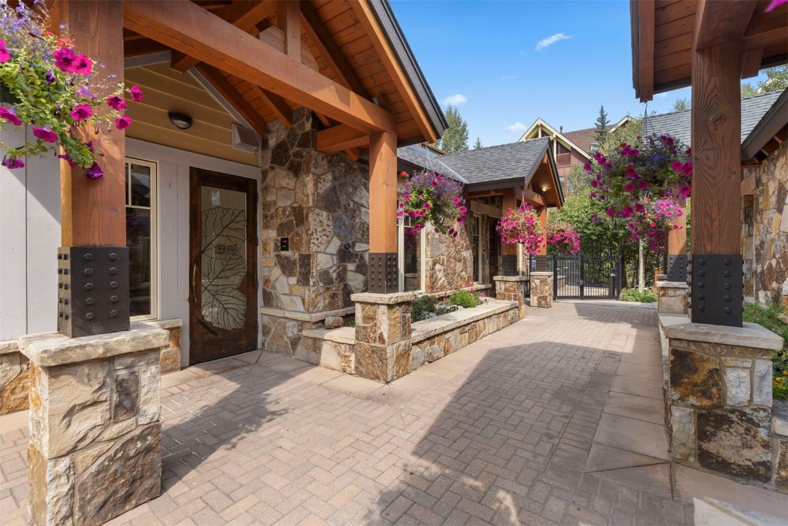 610 Columbine Road, Unit 6307 Breckenridge, CO 80424 - Photo 29 of 36 a front view of a building with street