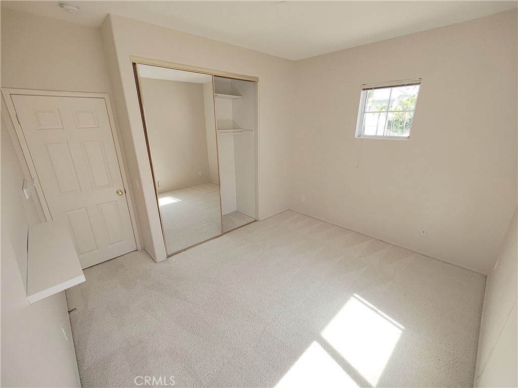 8 Vía Anadeja Rancho Santa Margarita, CA 92688 - Photo 9 of 22 an empty room with windows and closet