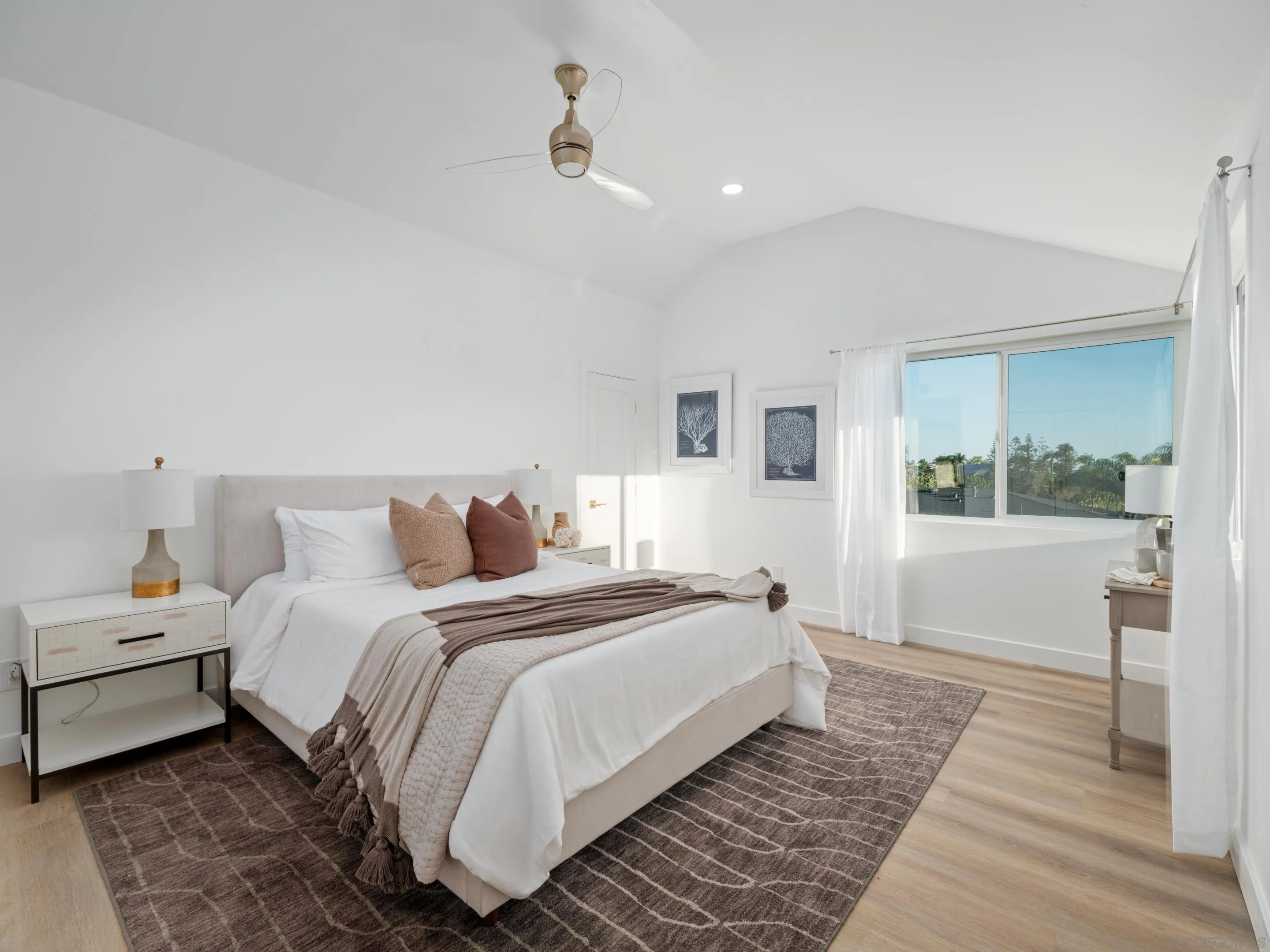 1868 Pariva Drive Cardiff, CA 92007 - Photo 12 of 30 a bedroom with a bed and a mirror