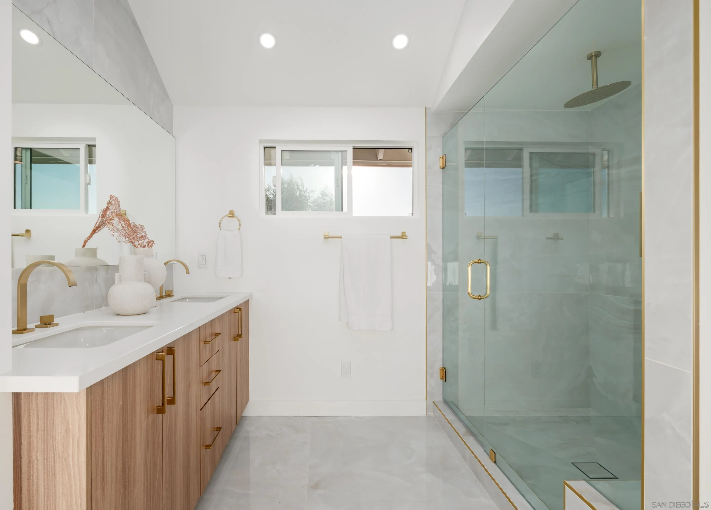 1868 Pariva Drive Cardiff, CA 92007 - Photo 14 of 30 a bathroom with double vanity and a shower