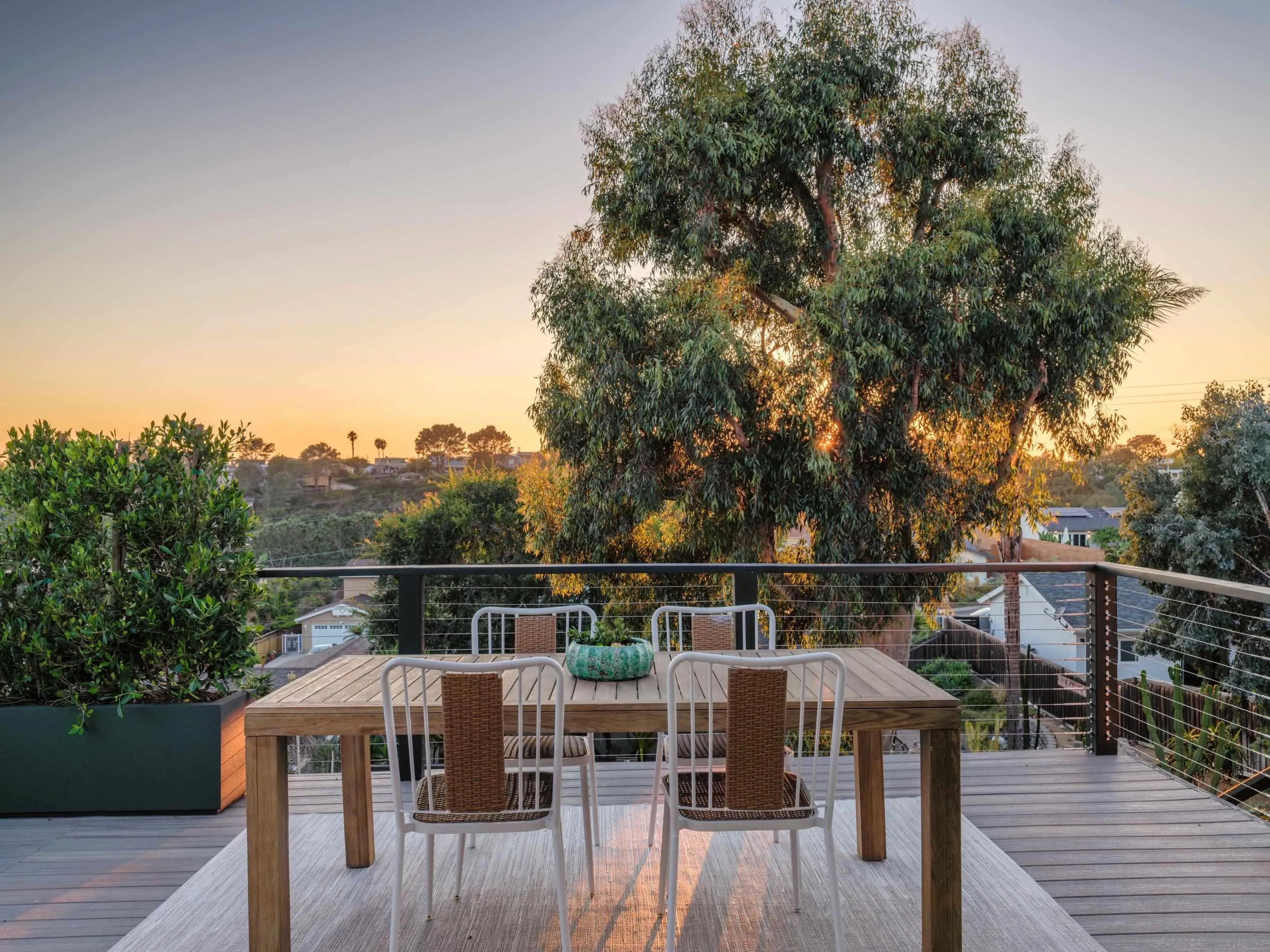 1868 Pariva Drive Cardiff, CA 92007 - Photo 2 of 30 a balcony with wooden floor table and chairs