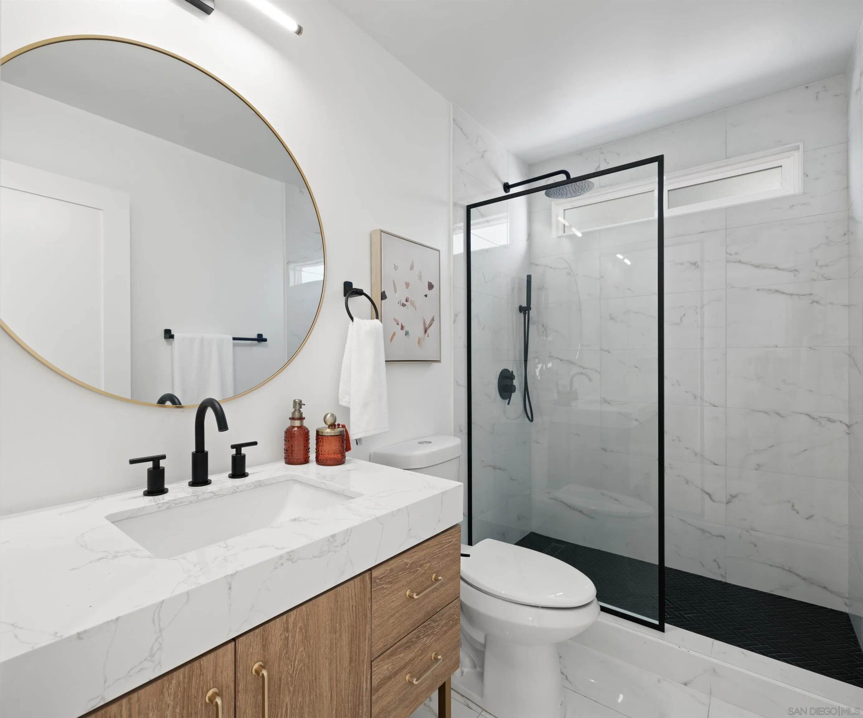 1868 Pariva Drive Cardiff, CA 92007 - Photo 21 of 30 a bathroom with a sink toilet and shower