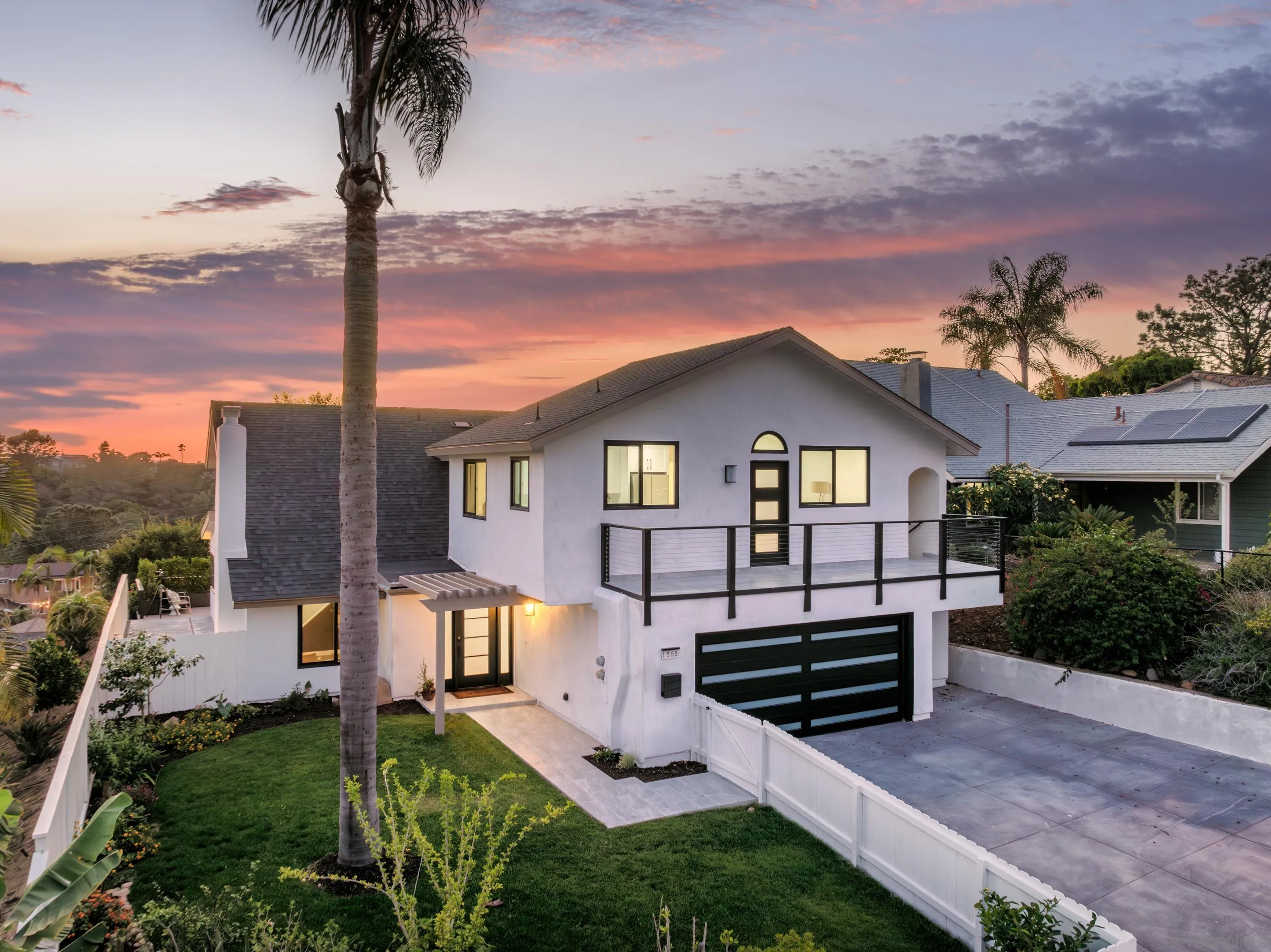 1868 Pariva Drive Cardiff, CA 92007 - Photo 22 of 30 a front view of a house with a yard and mountain view