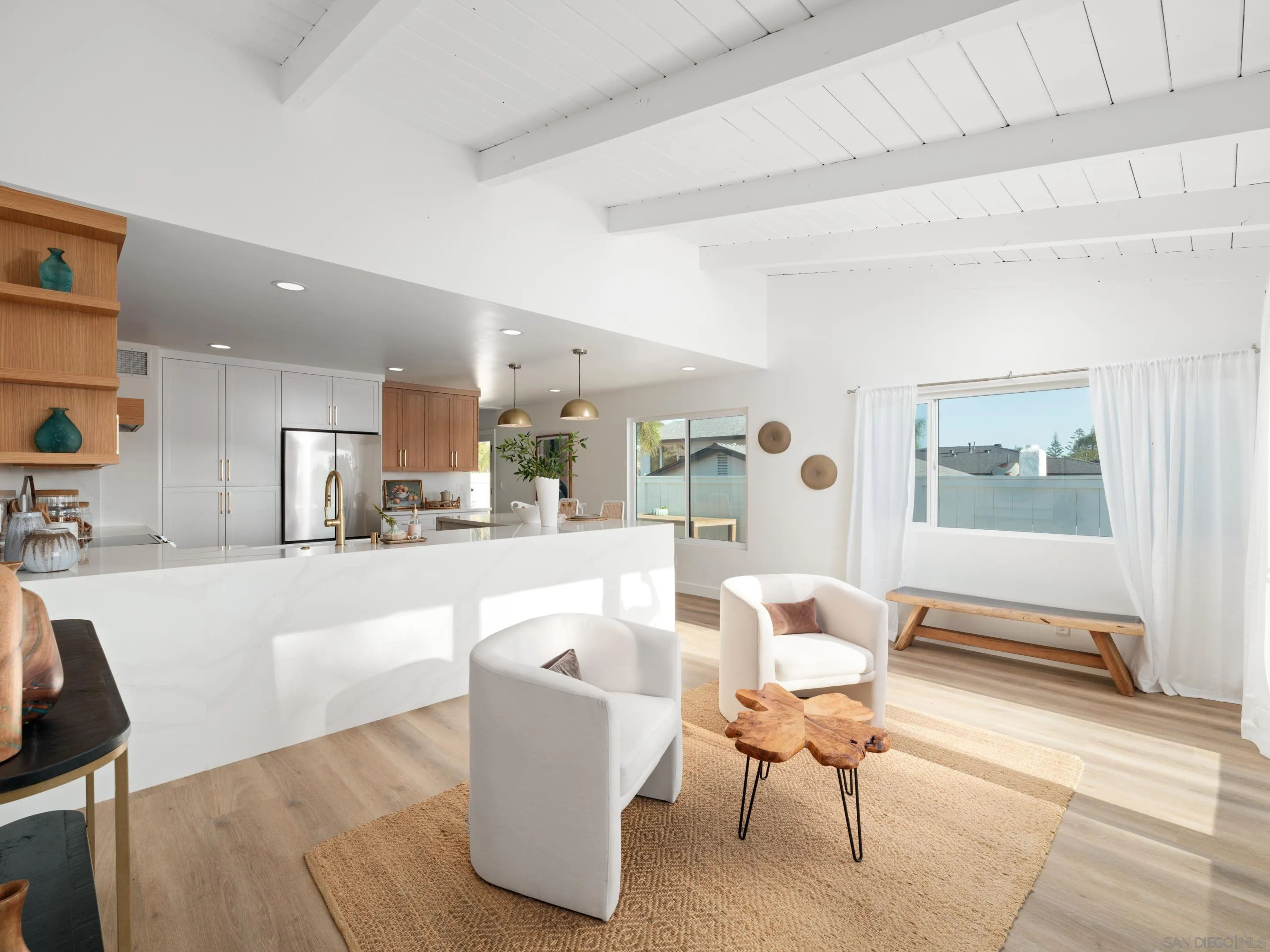 1868 Pariva Drive Cardiff, CA 92007 - Photo 6 of 30 a living room with furniture and a table