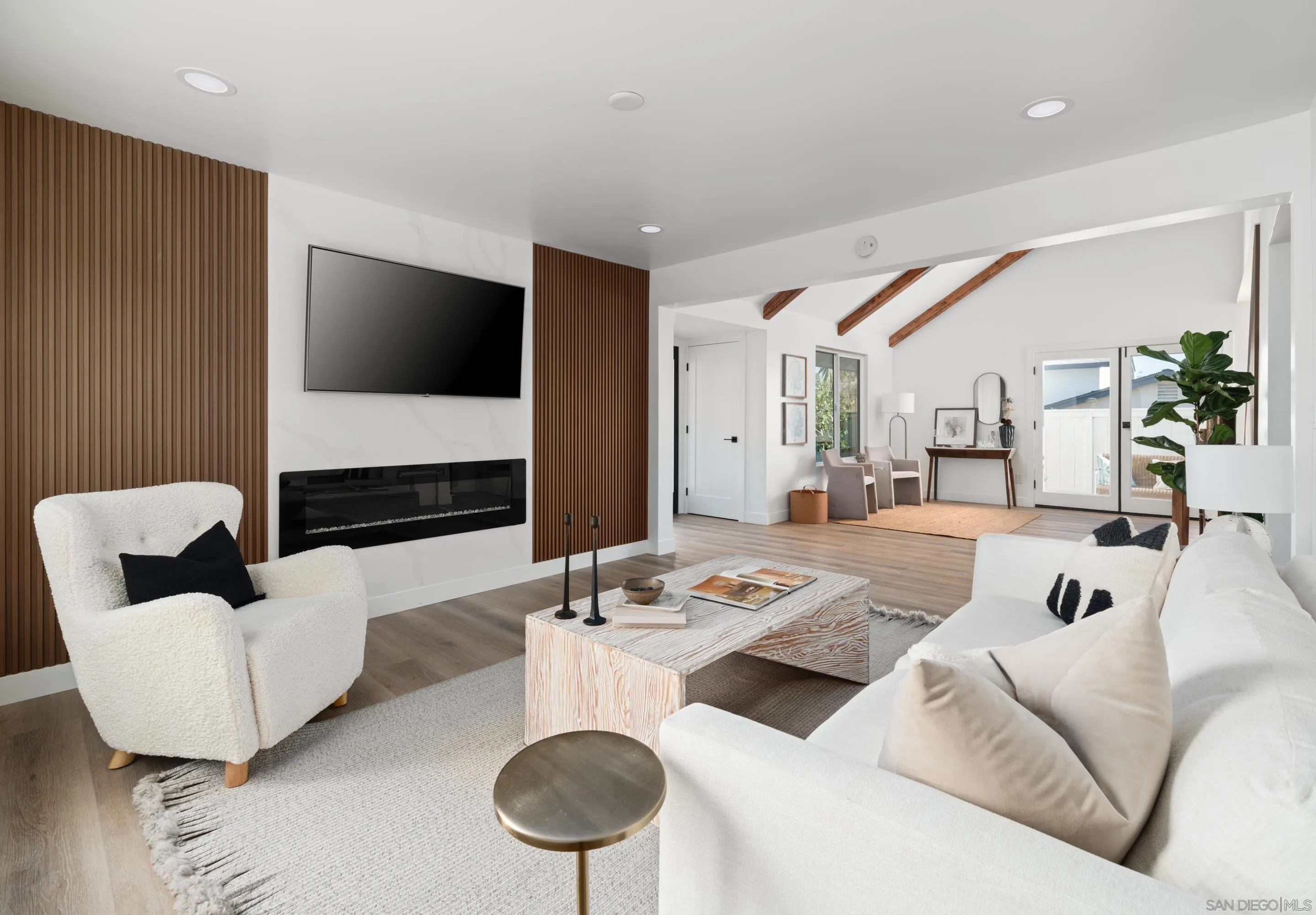 1868 Pariva Drive Cardiff, CA 92007 - Photo 9 of 30 a living room with furniture and a flat screen tv