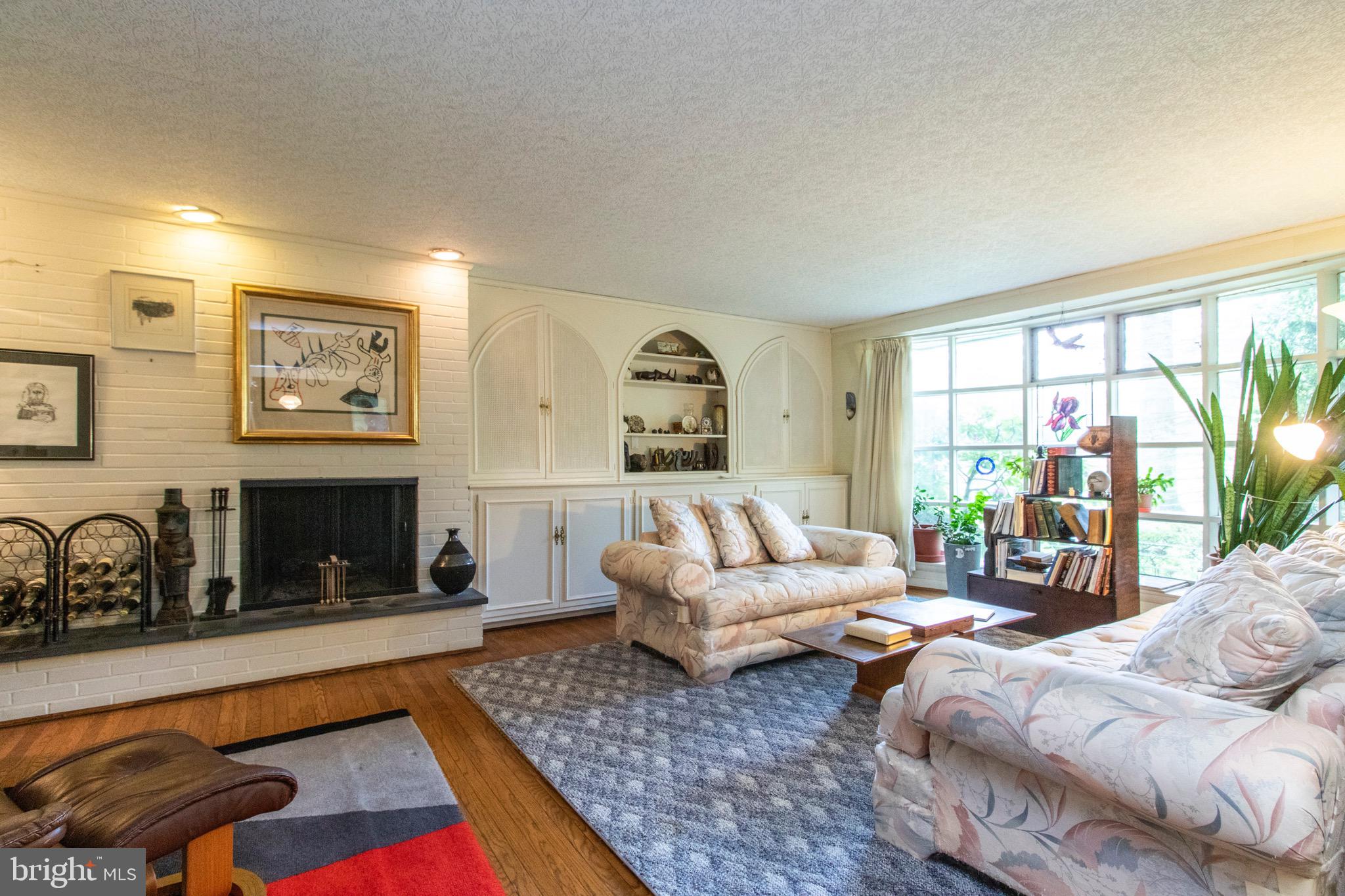 1841 Cobden Road Glenside, PA 19038 - Photo 5 of 20 Living room Fireplace, hardwood floors