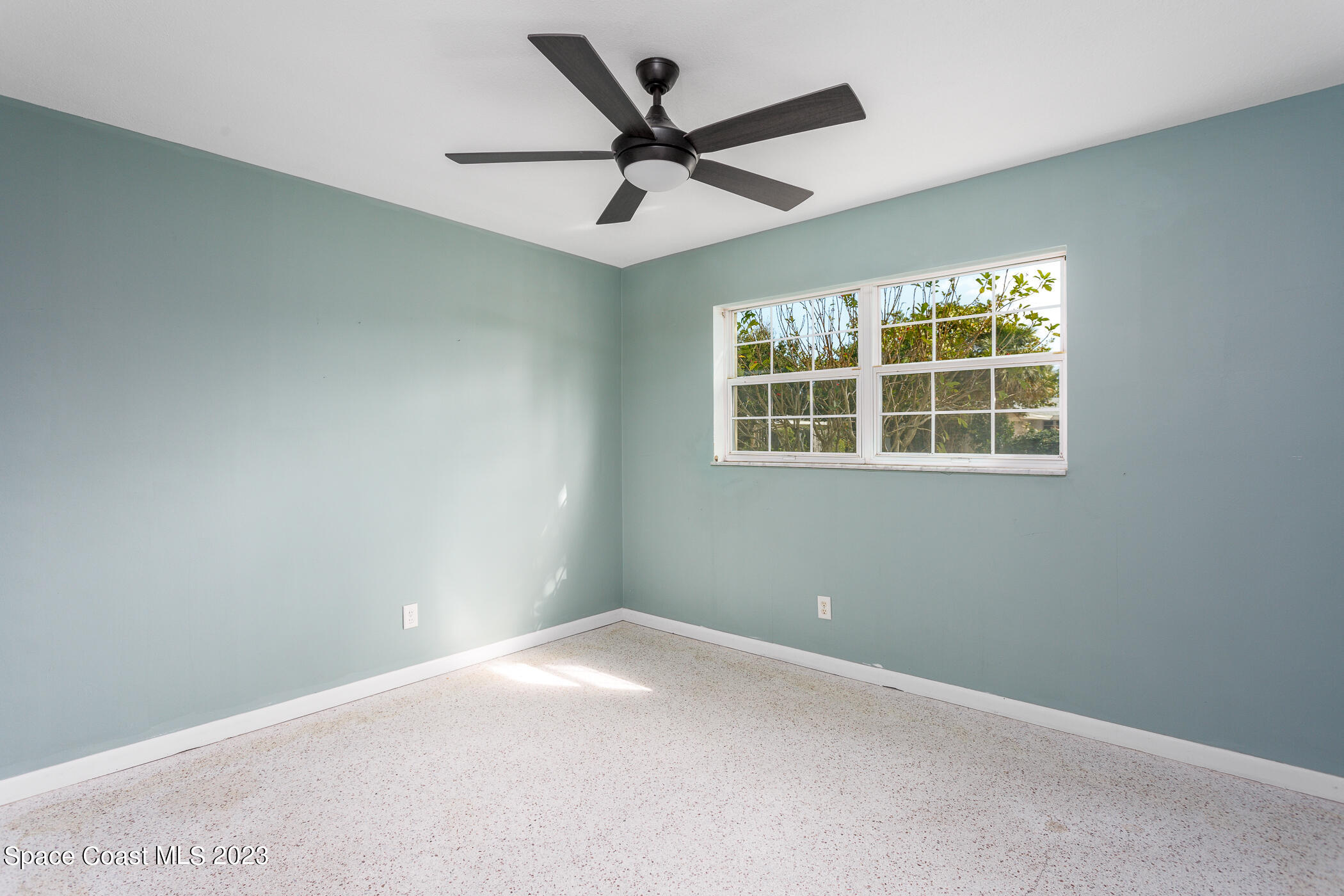 608 Mango Drive Melbourne Beach, FL 32951 - Photo 14 of 30 an empty room with a window